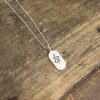 Sterling Oval Disc w/ Laser Engraved “Serpent” on a Chain